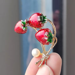 Stylish Strawberry Enamel Pin on fabric