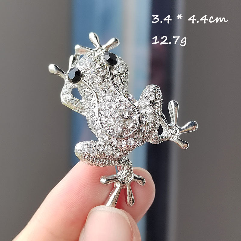 Charming Frog Brooch on accessory display