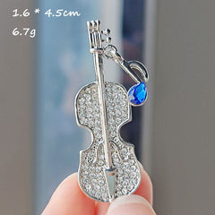 Close Up of Musical Note Brooch