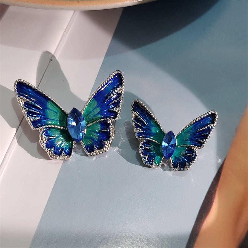 Elegant butterfly brooch on a jacket