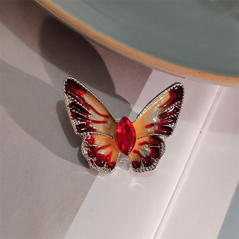 Butterfly brooch pin with vibrant colours