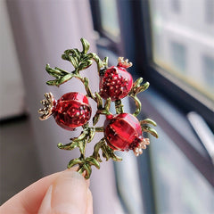 Assorted fruit brooches in a creative display