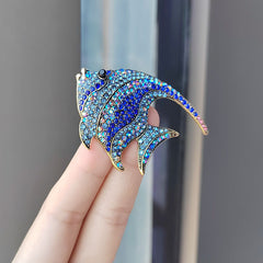 rhinestone brooch worn on a stylish jacket