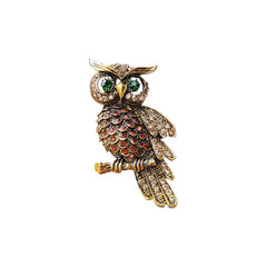 Elegant showcase of the owl brooch from multiple angles