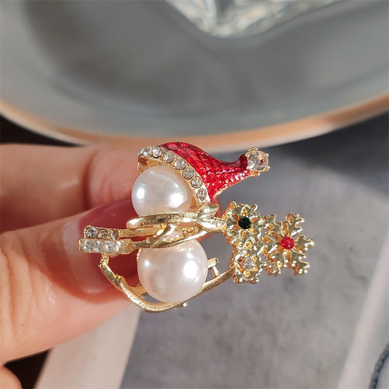 Brooch with snowman design close-up