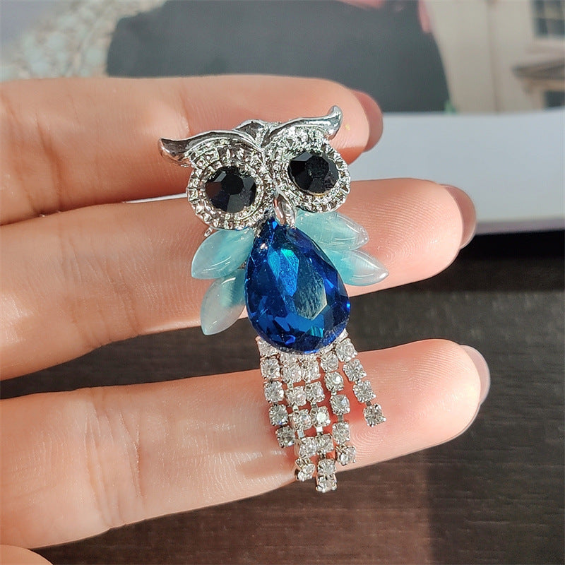 Green owl pin with sparkling embellishments