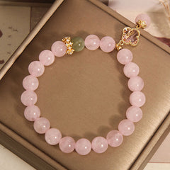 Charming pink quartz bracelet on a wrist