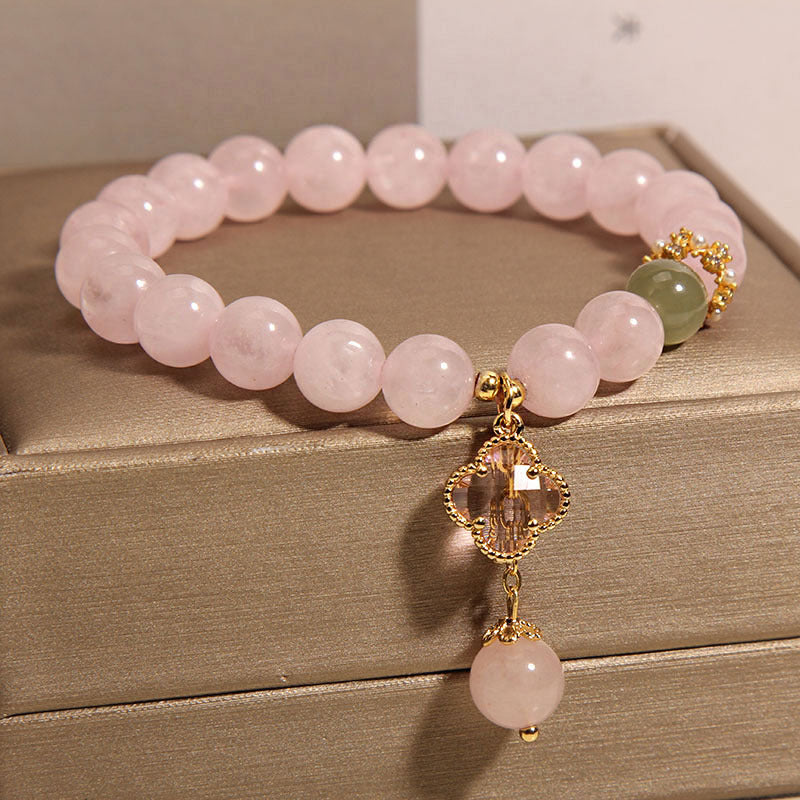 Stylish pink quartz bracelet displayed elegantly