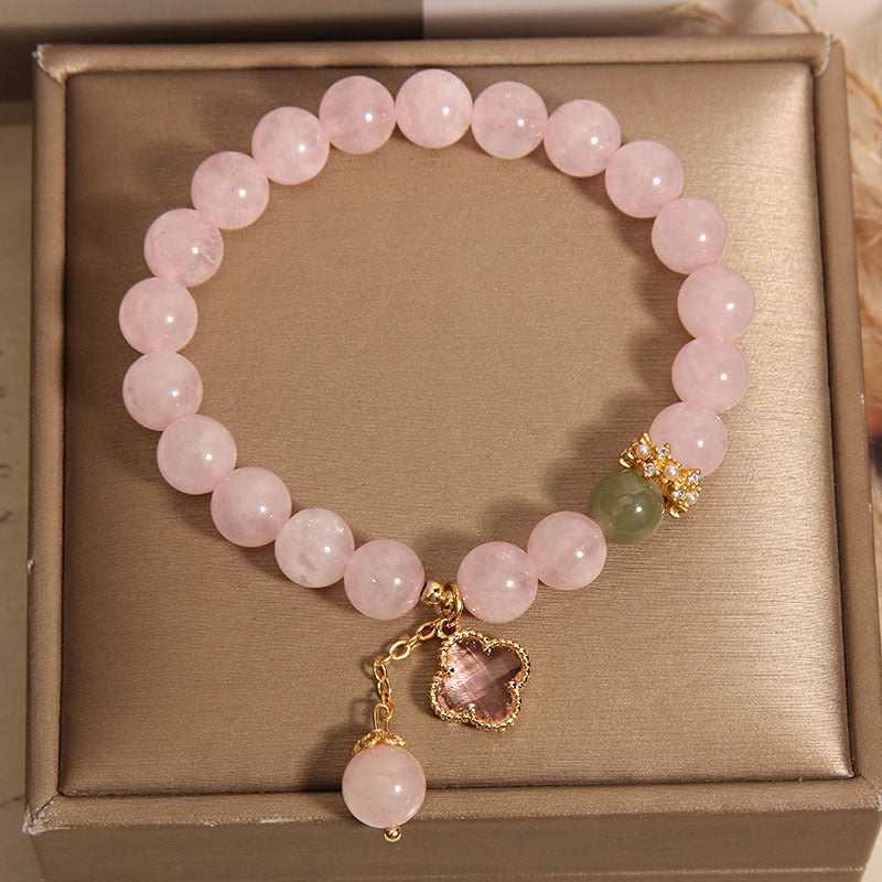Charming pink quartz bracelet on a wrist