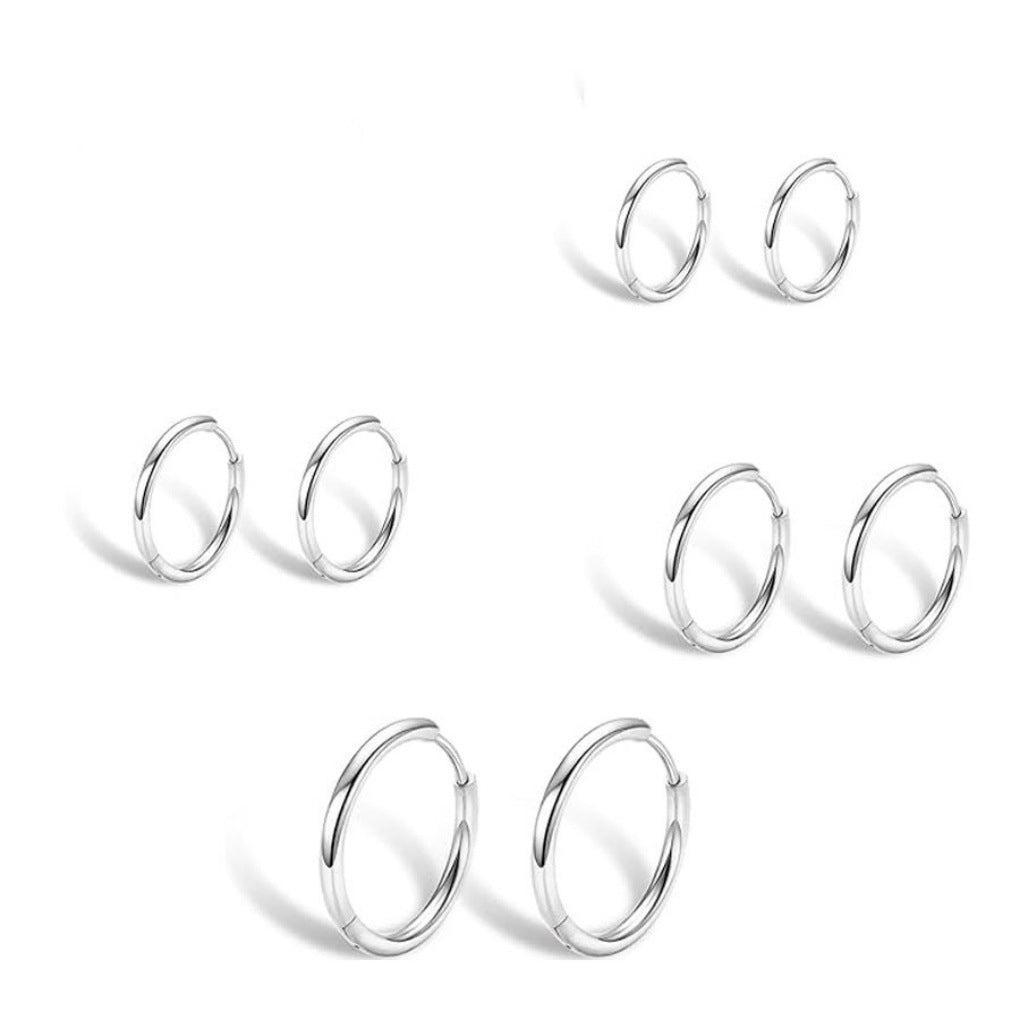 Close-up of stainless steel hoop earrings