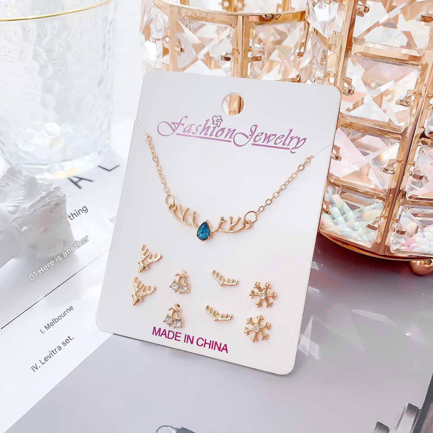 Stylish gold jewelry featured on a model
