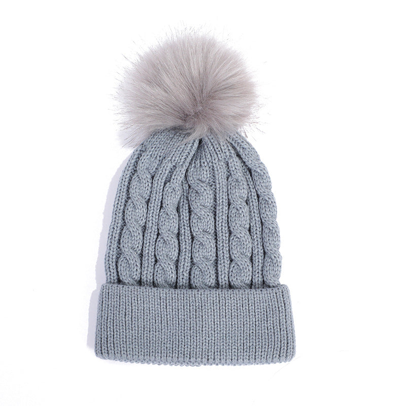 Multiple knit beanie hats in various colours