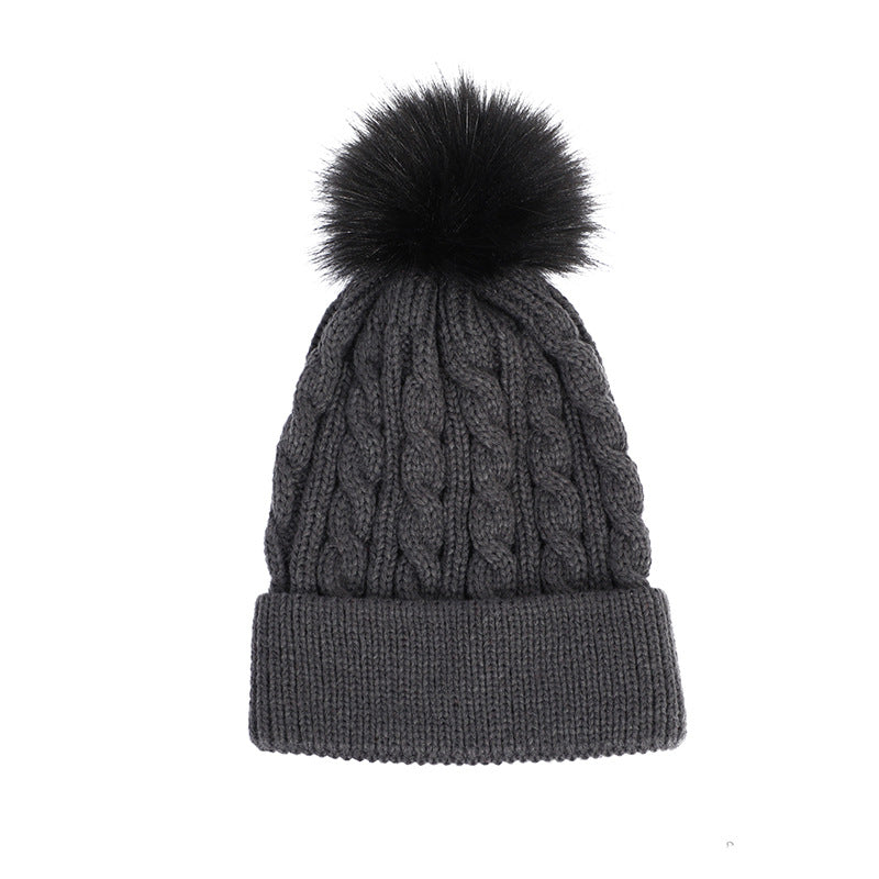 Cozy knit beanie hat in beige with pom pom
