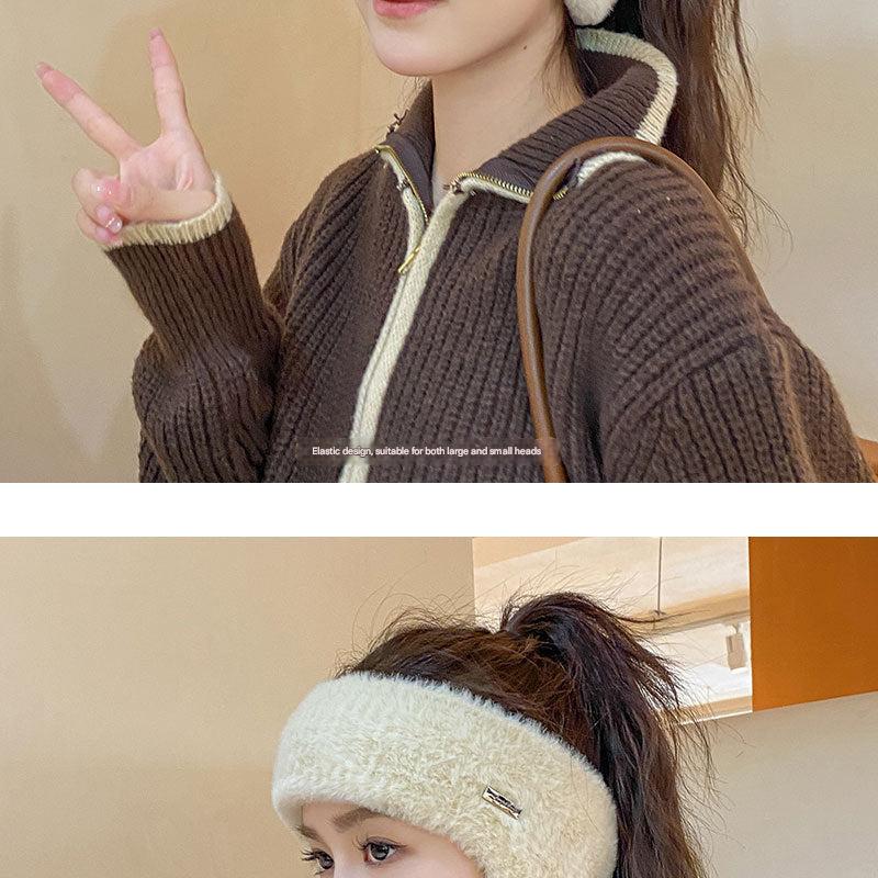 Black winter beanie shown in casual setting