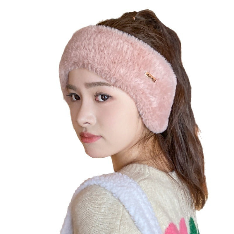 Fleece beanie worn outdoors on a chilly day