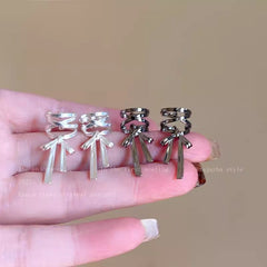 Non-pierced ear cuff model wearing silver version