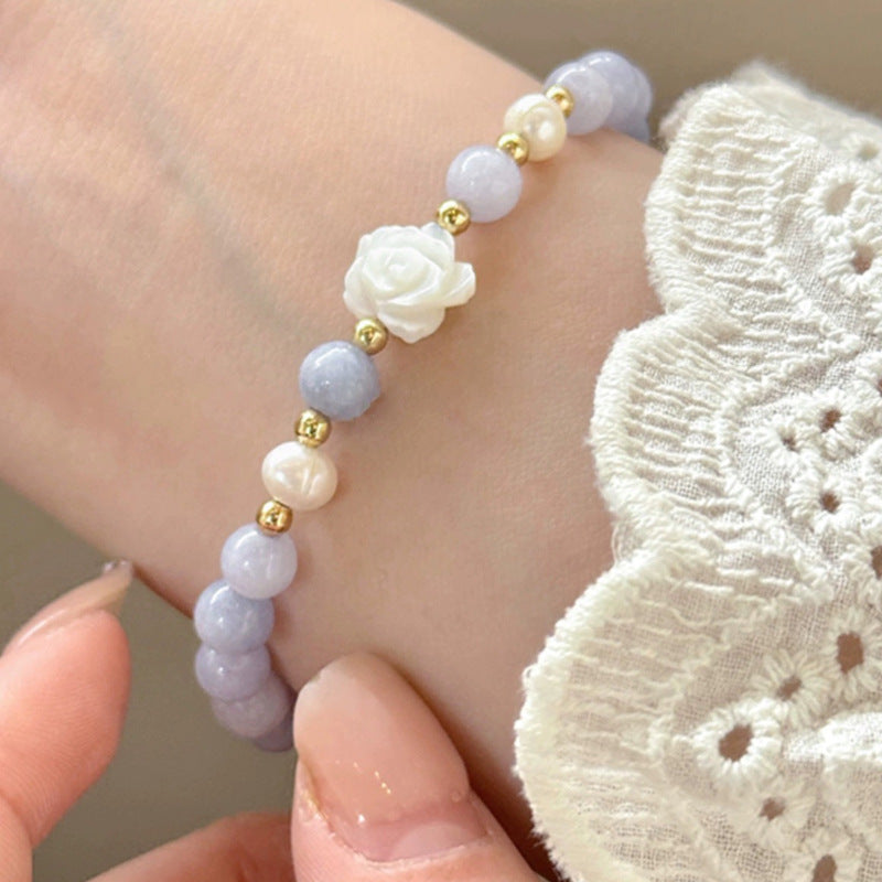 elegant camellia flower bracelet on display