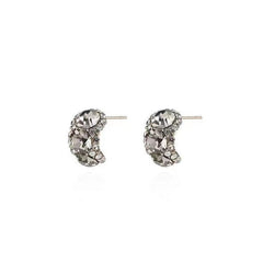 unique geometric earrings on a model