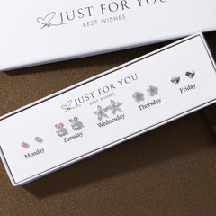 close-up of elegant heart and flower drop earrings image 2