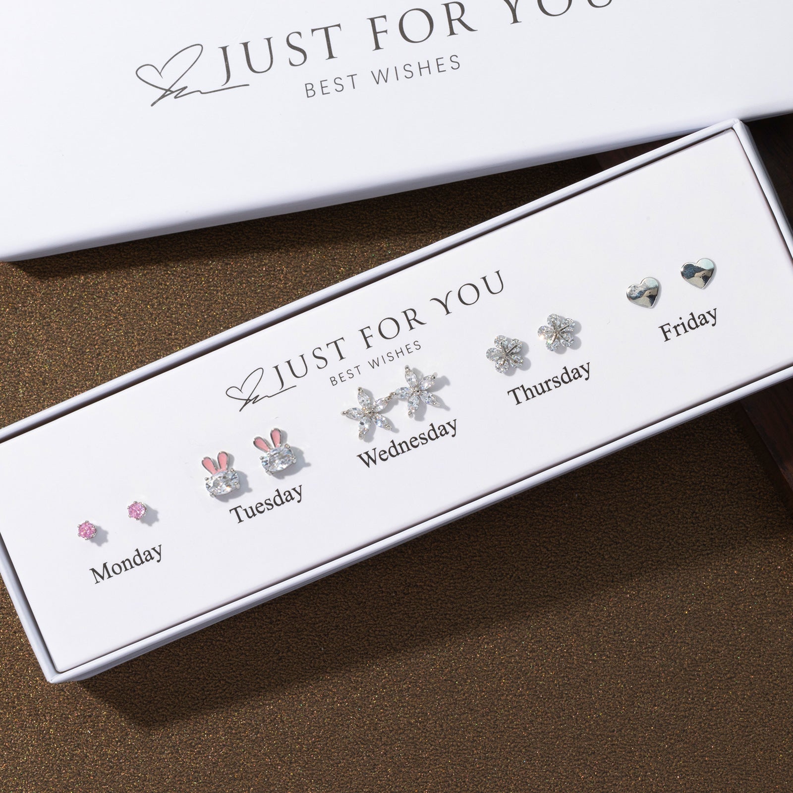 close-up of elegant heart and flower drop earrings image 2