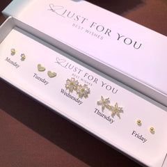 Everyday wear S925 silver earrings flat lay