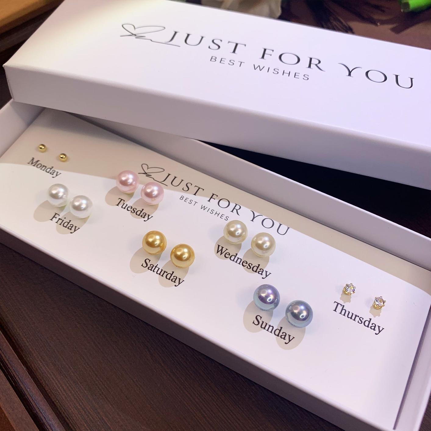 Everyday wear S925 silver earrings flat lay