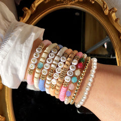 Collection of friendship bracelets in various colours