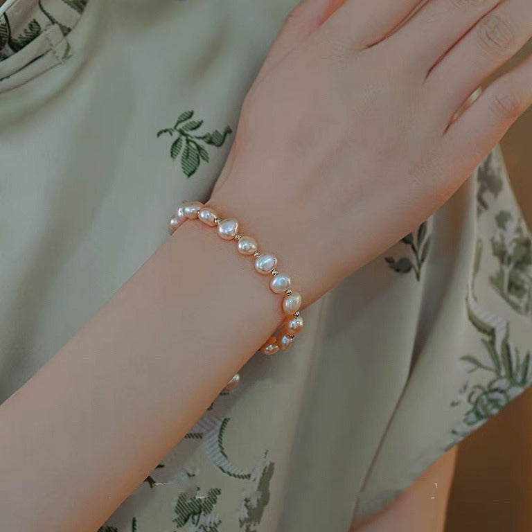 Adjustable faux pearl bracelet displayed in gift box