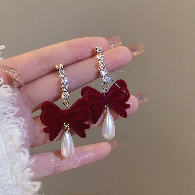 Chic burgundy velvet bow earrings elegant design