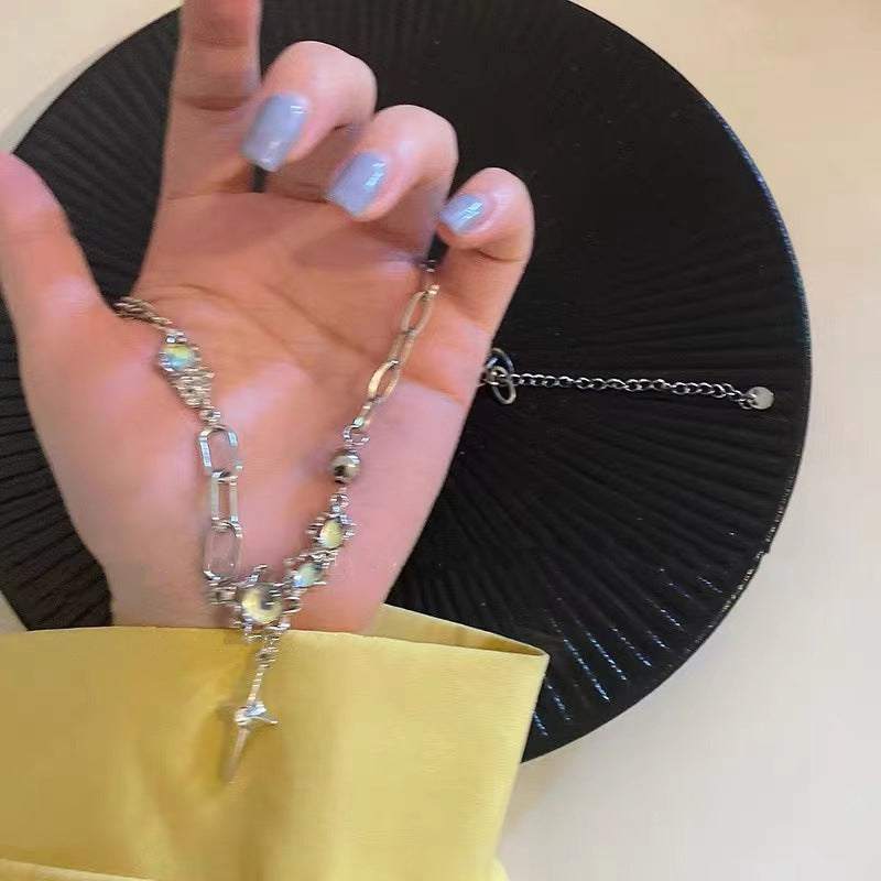 Elegant display of moonstone cross necklace