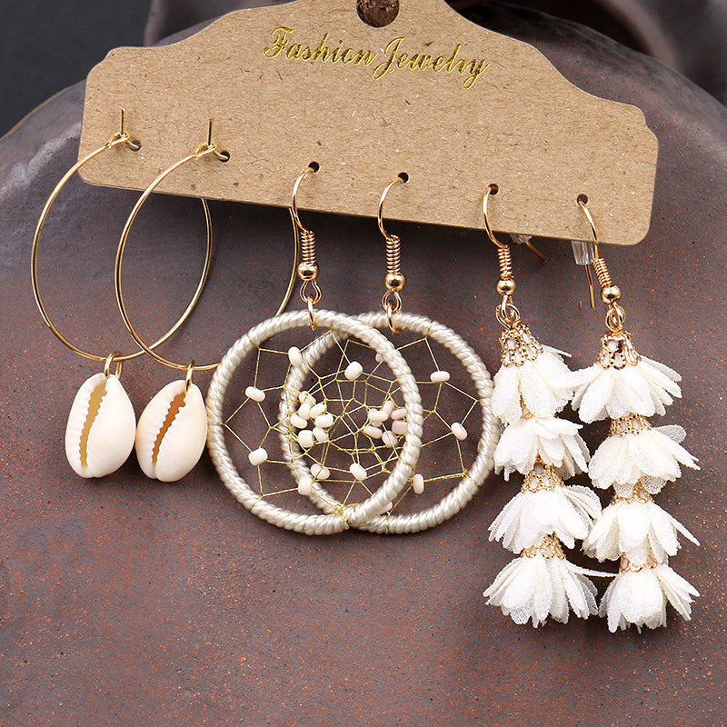 High-quality shell earrings in golden colour