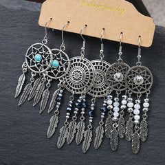 Close-up of waterdrop earrings in vibrant colours image 2