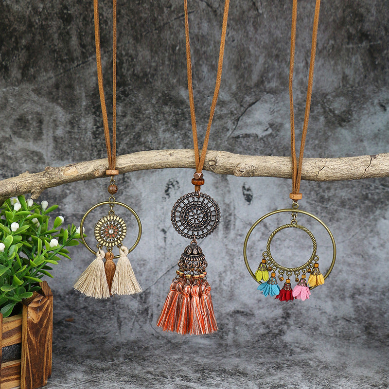 Bohemian long necklace floral pendant close-up