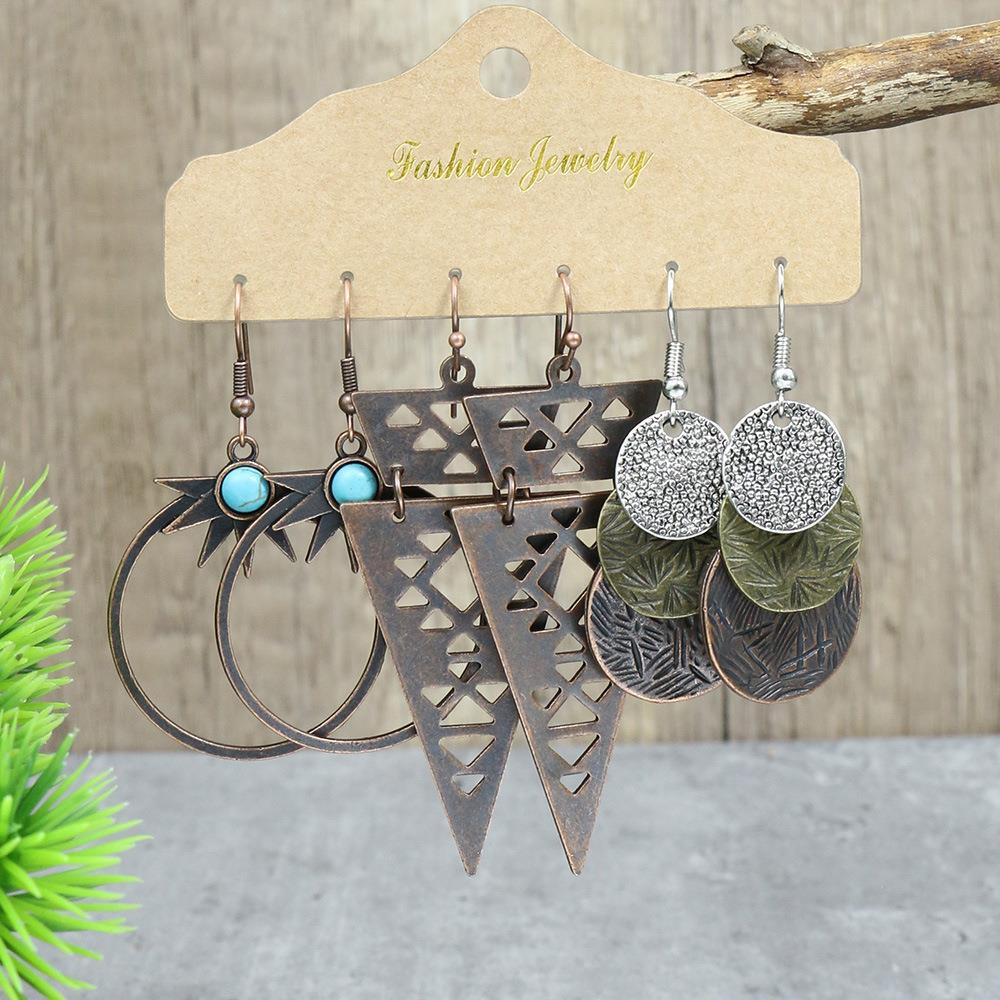 purple tassel earrings on display