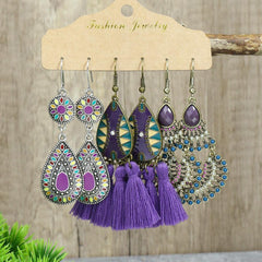 close-up of geometric design long tassel earrings