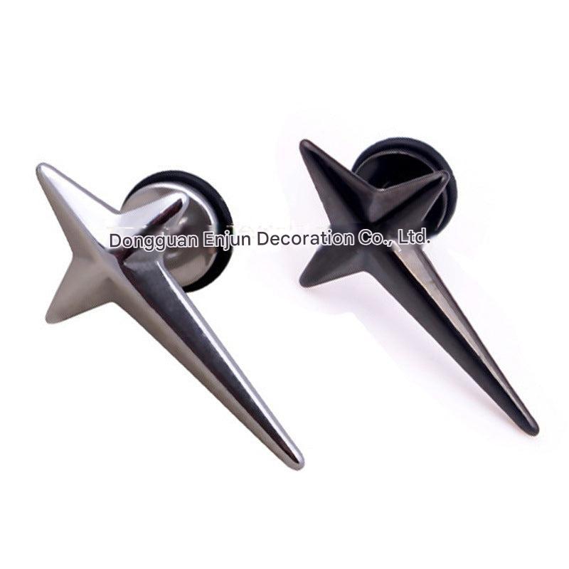 Close up of titanium earrings on model's ear