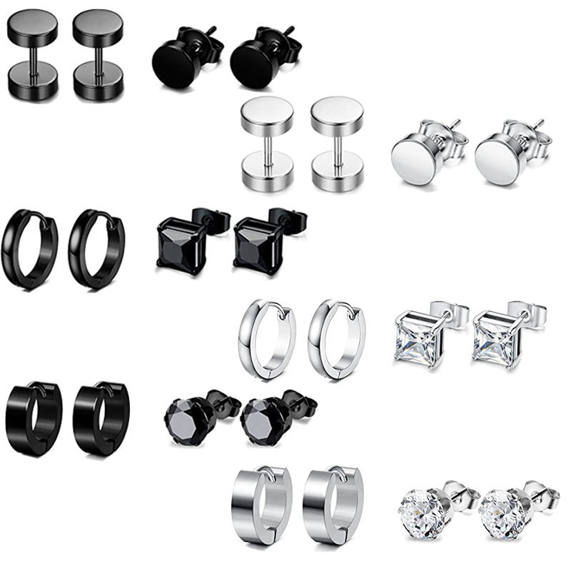 Close-up of stainless steel cross design earrings