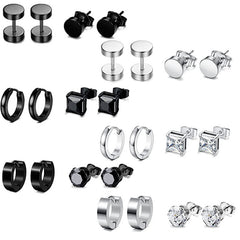 Close-up of stainless steel cross design earrings