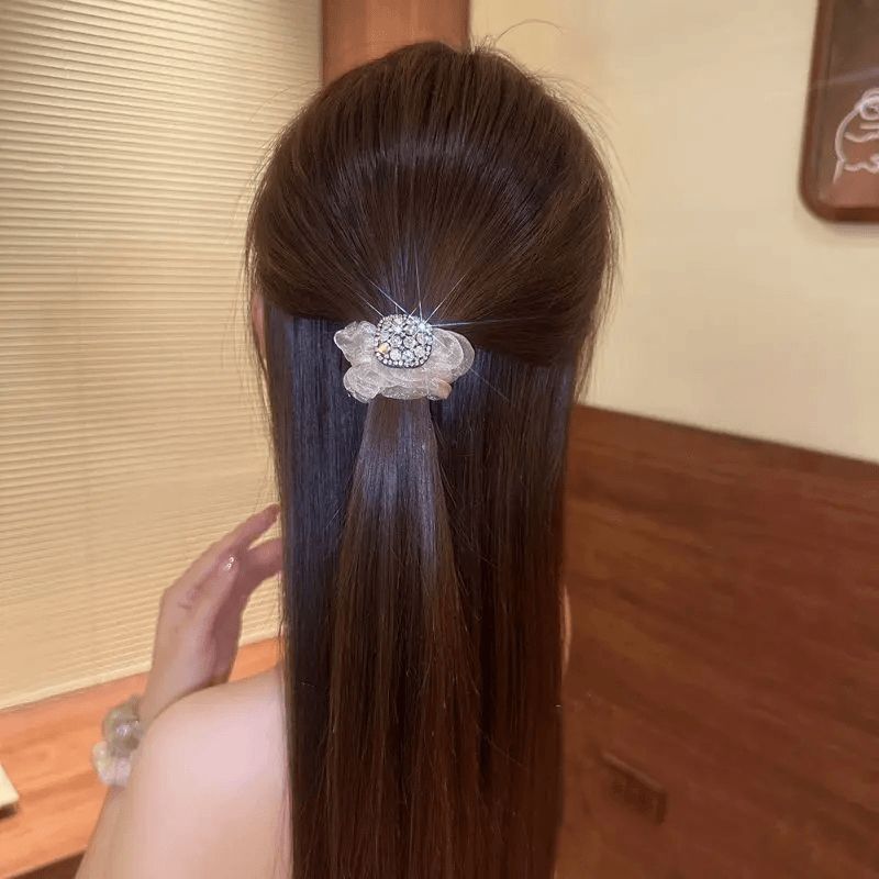 Purple diamond mesh hair tie on display