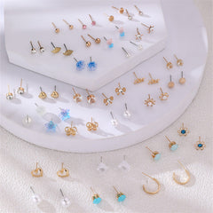 Pearl stud earrings on soft textile
