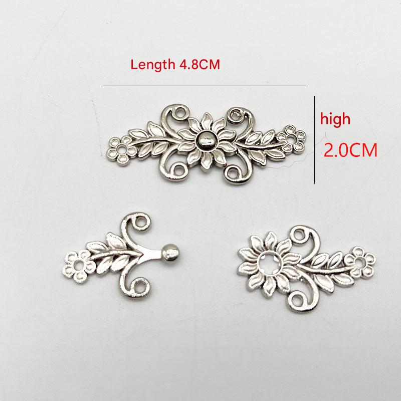 Metal clasp installation on clothing