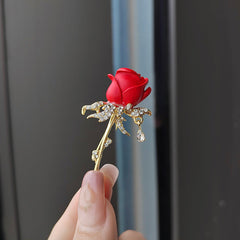 Brooch displayed on a bridal gown