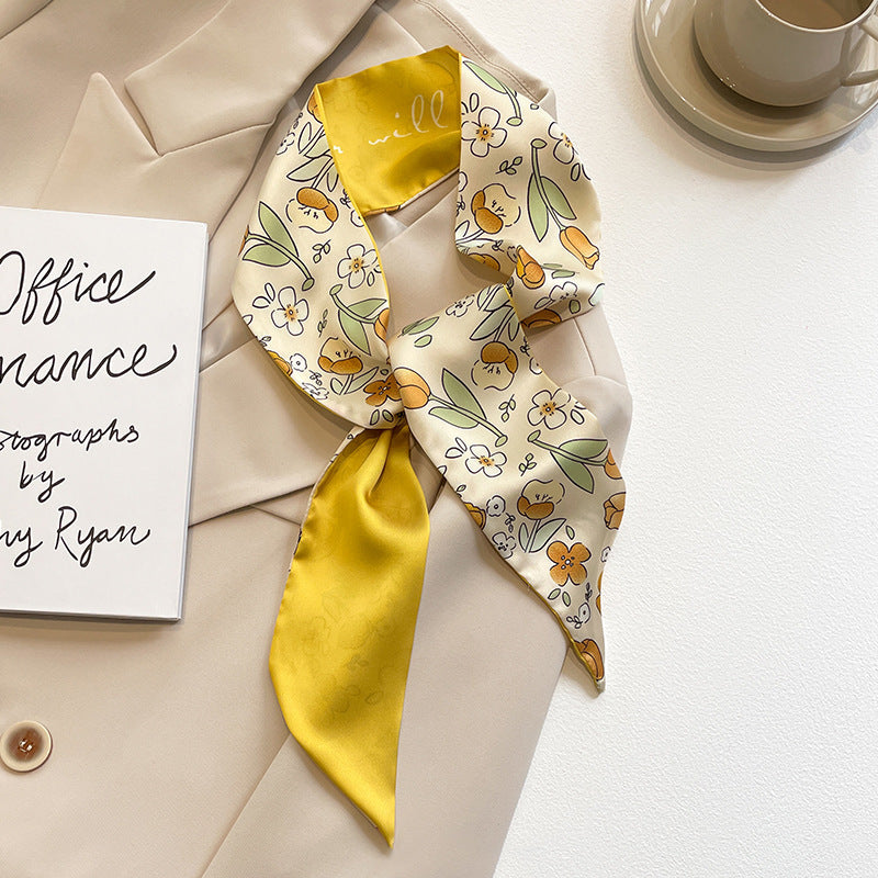 yellow scarf displaying floral designs