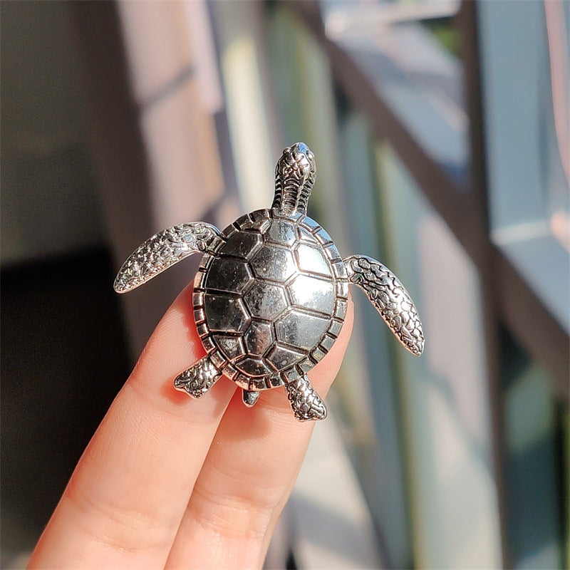 Stylish Turtle Pin in fashion context