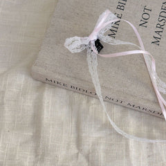 Stylish white bow hair clip for ballet fans