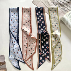 Elegant daisy print scarf worn as headband image 2