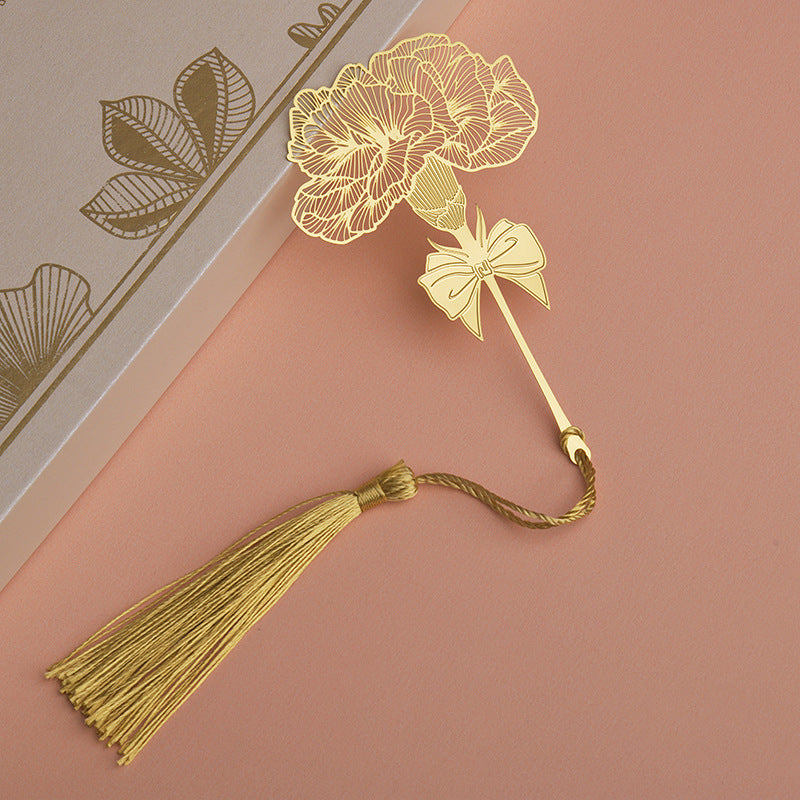 Elegant bookmark resting next to books