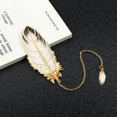 metal bookmark with dangle resting on table image 9